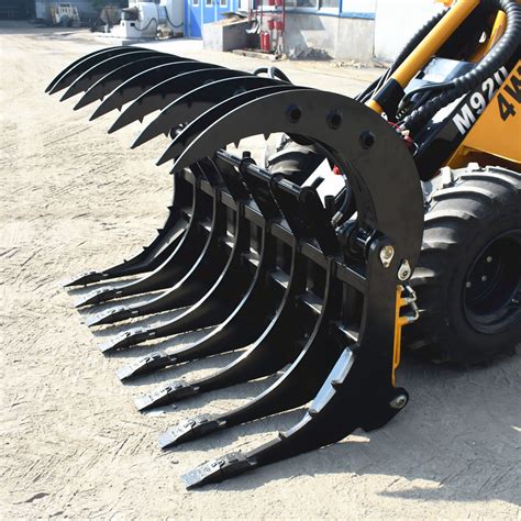 skid steer loader root rake|skid steer root rake grapple.